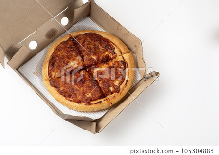Margherita Pizza in a cardboard box against a white background. Pizza delivery. top view. 105304883
