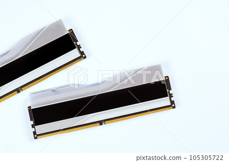 White background highlights 288-Pin SDRAM DDR5 memory modules to desktop computer. White background highlights 288-Pin SDRAM DDR5 memory modules to desktop computer. 105305722