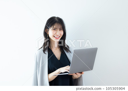 A woman in a black dress A woman in a black dress 105305904