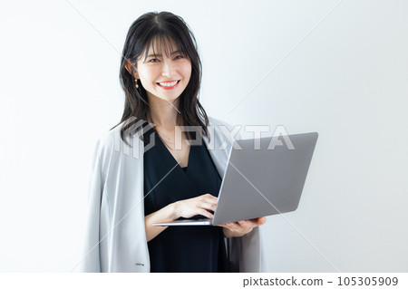 A woman in a black dress A woman in a black dress 105305909