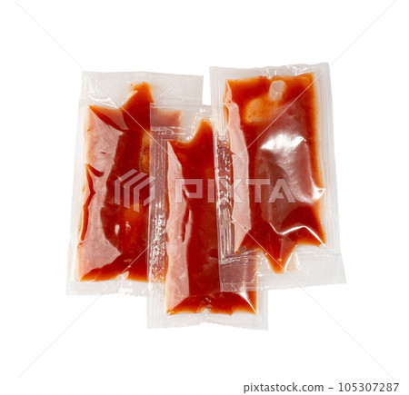 Ketchup in Square Plastic Bag Isolated, One-Time Portion of Tomato Sauce, Transparent Catsup Sachet Ketchup in Square Plastic Bag Isolated, One-Time Portion of Tomato Sauce, Transparent Catsup Sachet 105307287