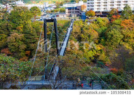 Tochigi Nikko City Kinugawa Onsen with autumn leaves Kinu Tateiwa Otsuribashi Bridge 105308433