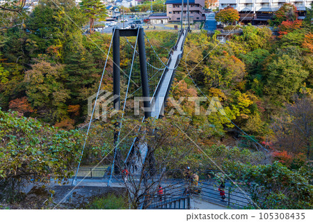 Tochigi Nikko City Kinugawa Onsen with autumn leaves Kinu Tateiwa Otsuribashi Bridge 105308435