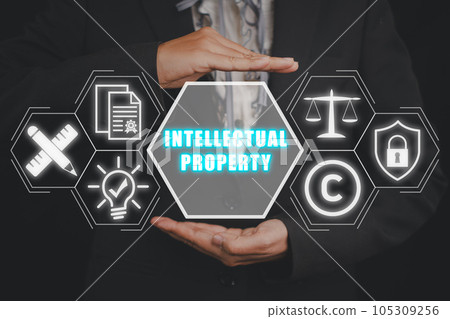 Intellectual property concept, Businesswoman hand holding intellectual property icon on virtual screen. Intellectual property concept, Businesswoman hand holding intellectual property icon on virtual screen. 105309256