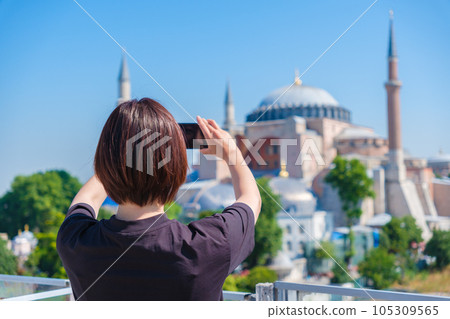 Woman taking pictures of Hagia Sophia Woman taking pictures of Hagia Sophia 105309565