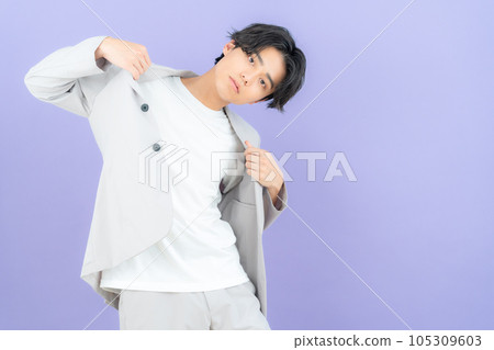 young man with purple back young man with purple back 105309603