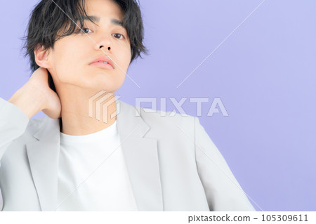 young man with purple back young man with purple back 105309611