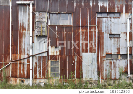 old and damaged house 105312893