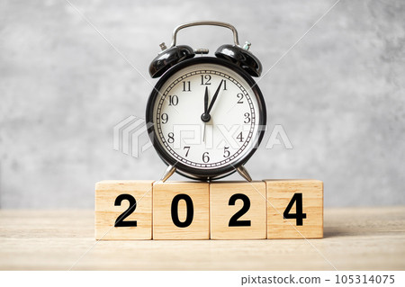 2024 text with clock on table. Resolution, time, plan, goal, motivation, reboot, countdown and New Year holiday concepts 105314075