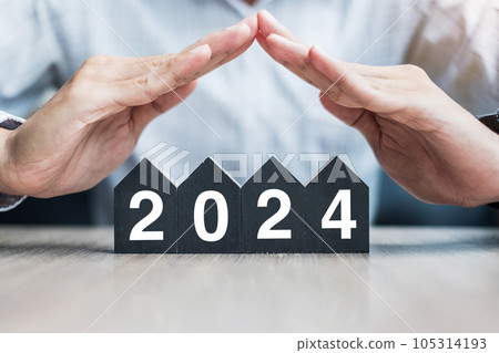 Businessman hands over 2024 Happy New Year with house model on table office. Property insurance and real estate concepts Businessman hands over 2024 Happy New Year with house model on table office. Property insurance and real estate concepts 105314193