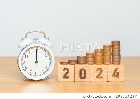 Happy New Year with vintage alarm clock and flipping 2023 change to 2024 block. Resolution, Goals, Plan, Action, Money Saving, Retirement fund, Pension, Investment and Financial concept 105314287