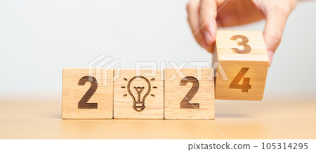 2024 block with lightbulb. Business Idea, Creative, Thinking, brainstorm, Goal, Resolution, strategy, plan, Action, change and New Year start concepts 2024 block with lightbulb. Business Idea, Creative, Thinking, brainstorm, Goal, Resolution, strategy, plan, Action, change and New Year start concepts 105314295