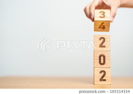 2023 change to 2024 year block on table. goal, Resolution, strategy, plan, start, budget, mission, action, motivation and New Year concepts 2023 change to 2024 year block on table. goal, Resolution, strategy, plan, start, budget, mission, action, motivation and New Year concepts 105314334