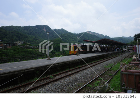 Trains on the Pingxi Line stopping at Shifen Station in Taiwan 105315643