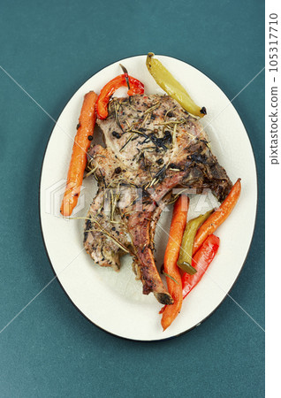 Delicious juicy pork tomahawk steak Delicious juicy pork tomahawk steak 105317710