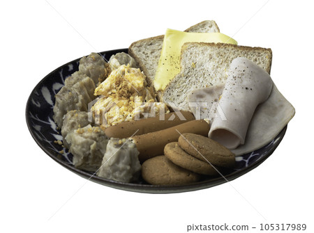 Homemade breakfast is including Breads, Fried sausages, Ham, Pork shumais, Scrambled eggs, Cheese, Crispy ginger cookies on ceramic plate isolated on white background with clipping path. Homemade breakfast is including Breads, Fried sausages, Ham, Pork shumais, Scrambled eggs, Cheese, Crispy ginger cookies on ceramic plate isolated on white background with clipping path. 105317989