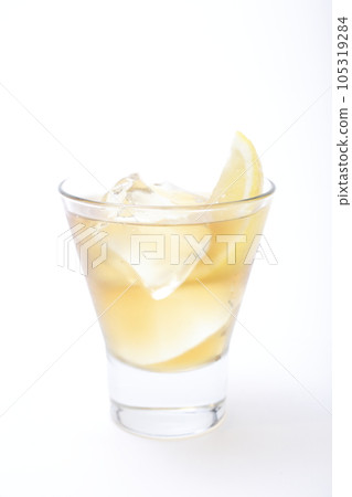 Lemon tea with rock ice shot on white background Lemon tea with rock ice shot on white background 105319284