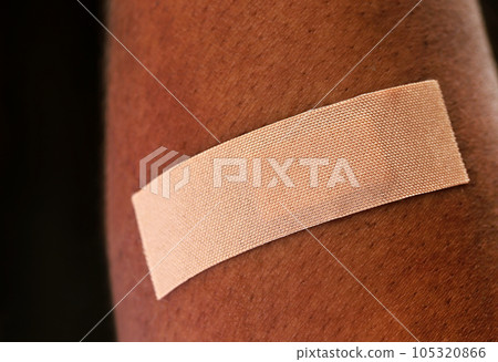 Plaster on human skin 105320866