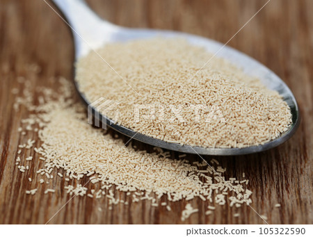 Yeast on a spoon 105322590