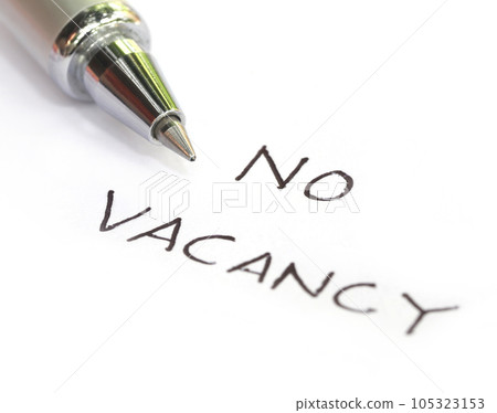 No vacancy written on a white paper 105323153