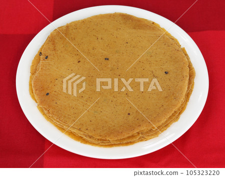 Roti bread made of wheat and lentil flour 105323220