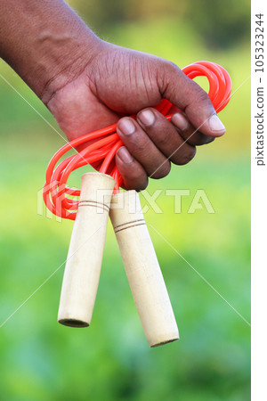 Skipping rope in hand 105323244
