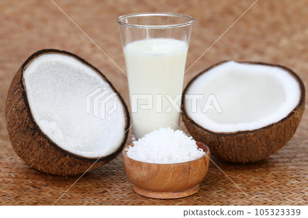 Fresh Coconut with milk in a glass Fresh Coconut with milk in a glass 105323339