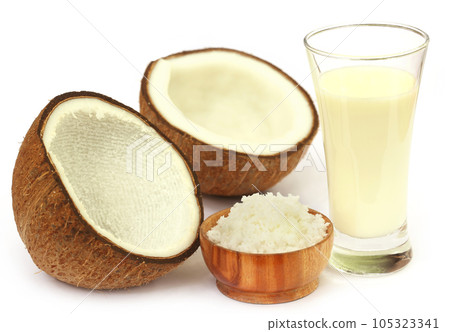 Fresh Coconut with milk in a glass Fresh Coconut with milk in a glass 105323341