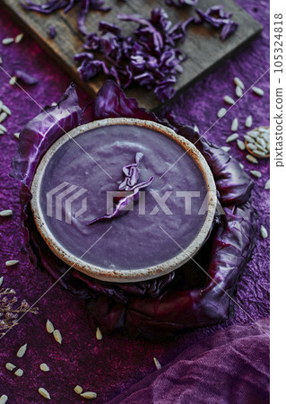 some red cabbage soup in a rustic ceramic bowl some red cabbage soup in a rustic ceramic bowl 105324818