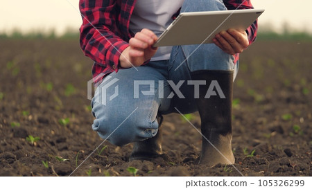 farmer working in tablet, hand holding earth soil soil, agriculture business, sprout green field farm, earth compost pattern dried fertilizer agronomist man mud land view dry holding fertile farmer working in tablet, hand holding earth soil soil, agriculture business, sprout green field farm, earth compost pattern dried fertilizer agronomist man mud land view dry holding fertile 105326299