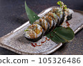 Sushi, delicious Japanese cuisine. Rolls of delicious sushi on a plate 105326486
