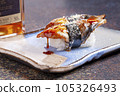 Sushi, delicious Japanese cuisine. Rolls of delicious sushi on a plate 105326493