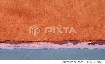 abstract sunset or sunrise landscape in blue and orange tones - a collection of handmade art papers abstract sunset or sunrise landscape in blue and orange tones - a collection of handmade art papers 105328969