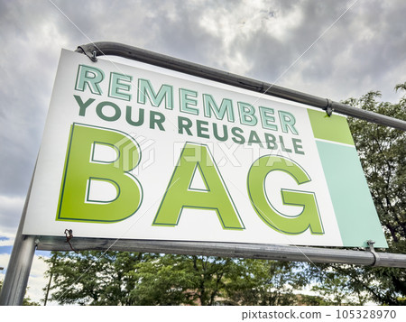 remember your reusable bag - sign in a parking lot of a grocery store remember your reusable bag - sign in a parking lot of a grocery store 105328970