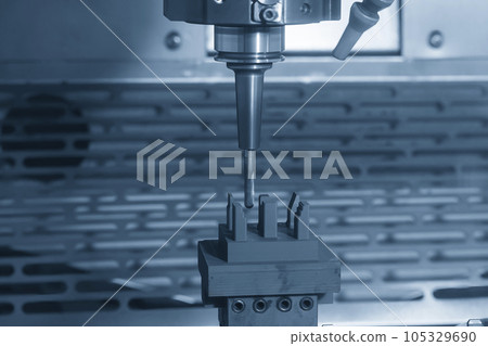 The CNC milling machine rough cutting the graphite electrode parts with solid flat end mill. 105329690