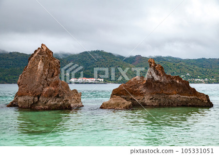 Samana bay landscape with two sharp coastal rocks Samana bay landscape with two sharp coastal rocks 105331051
