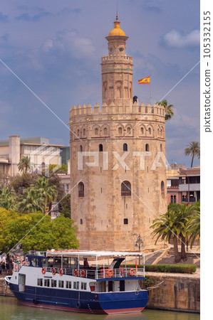 The golden tower of Torre del Oro on a sunny day. Seville. 105332155