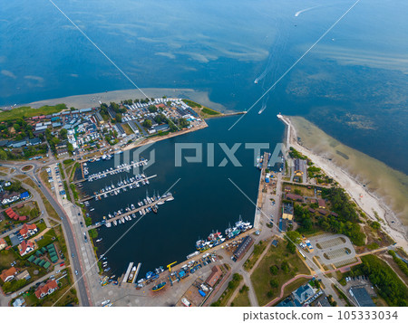 port and harbor with yachts and ships of Polish village Jastarnia, aerial view 105333034