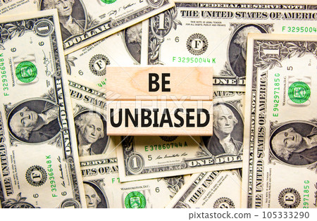Be unbiased symbol. Concept words Be unbiased on wooden block. Beautiful background from dollar bills. Dollar bills. Business psychology be unbiased concept. Copy space. Be unbiased symbol. Concept words Be unbiased on wooden block. Beautiful background from dollar bills. Dollar bills. Business psychology be unbiased concept. Copy space. 105333290