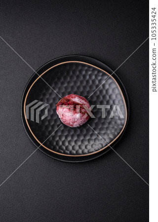 Delicious sweet colorful mochi desserts or ice cream with rice dough and toppings 105335424