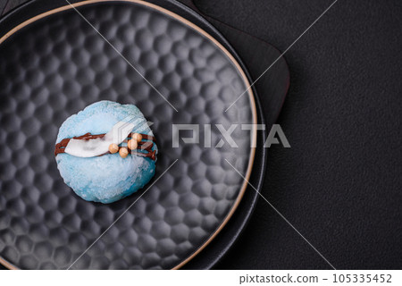 Delicious sweet colorful mochi desserts or ice cream with rice dough and toppings 105335452