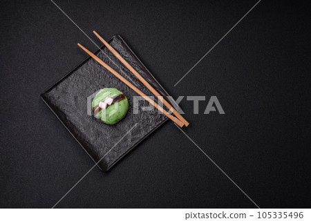 Delicious sweet colorful mochi desserts or ice cream with rice dough and toppings 105335496