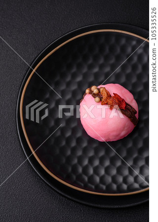 Delicious sweet colorful mochi desserts or ice cream with rice dough and toppings Delicious sweet colorful mochi desserts or ice cream with rice dough and toppings 105335526