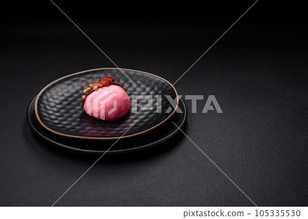 Delicious sweet colorful mochi desserts or ice cream with rice dough and toppings 105335530
