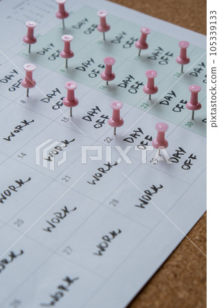 4 day work week printed calendar with pink pins on three days off in week weekend days four day working week concept. Modern approach doing business short workweek. Effectiveness of employees 4 day work week printed calendar with pink pins on three days off in week weekend days four day working week concept. Modern approach doing business short workweek. Effectiveness of employees 105339133