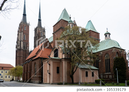 Wroclaw central market square with old houses. Historical capital of Silesia, Europe. City hall architecture buildings. Old town landmark cathedrals church 105339179