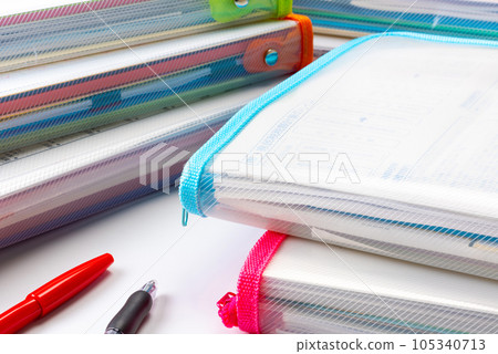 Stacked document files and pens _ pile of work _ document organization _ office work _ learning image 105340713