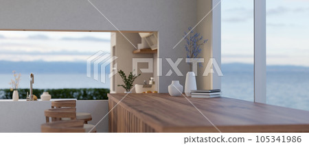 Copy space on a wooden tabletop against the window in a modern contemporary kitchen Copy space on a wooden tabletop against the window in a modern contemporary kitchen 105341986
