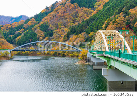 Tokyo Okutama Lake Okutama with autumn leaves Miyama Bridge and Mitsuhashi Bridge 105343552