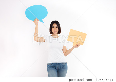 Portrait of woman holding a empty blue and brown speech bubble isolated on white background Portrait of woman holding a empty blue and brown speech bubble isolated on white background 105343844